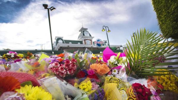 Floral tributes outside Dreamworld following the October 2016 Thunder River Rapids ride tragedy. Picture: Nigel Hallett